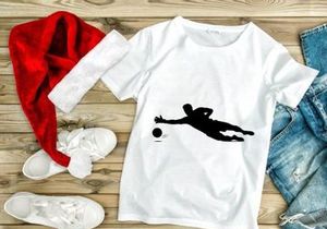 Soccer goalkeeper diving to save the ball in a match