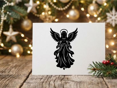 Black angel silhouette with wings and halo for spiritual or holiday themes