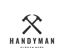 Vintage retro crossed hammers logo.