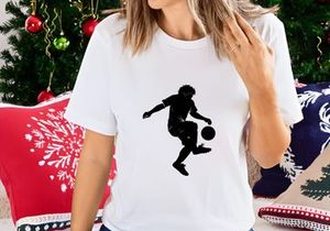 A soccer player kicking a ball in mid air with dynamic movement and energy