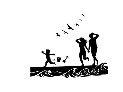 Silhouette of family on beach with waves and birds