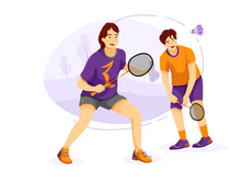 Young man and girl playing badminton outdoors