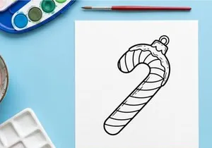 Hand-drawn candy cane with bow for festive Christmas holiday celebration decoration