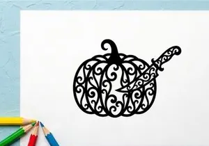 Decorative Halloween pumpkin with intricate swirling design and leaf