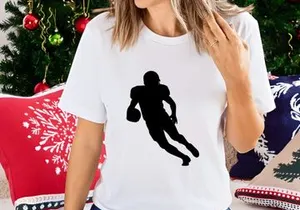 American football player running with ball in hand silhouette