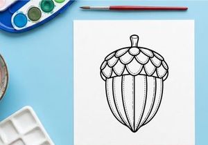 Cute acorn ornament with detailed cap. Decorative natural-inspired accessory for crafts and seasonal decor.