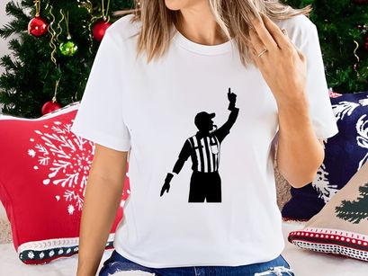 A black silhouette of a referee signaling a penalty in a sporting event