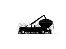 Silhouette of a truck with a grain auger in a field