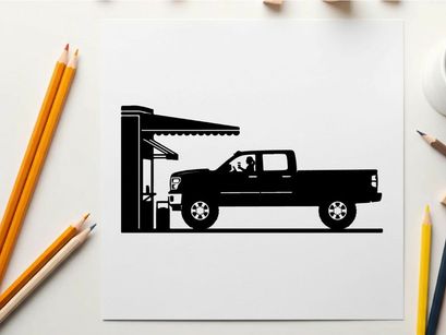 Silhouette of a pickup truck refueling at a gas station