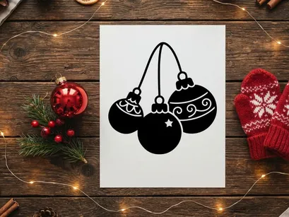 Festive Christmas ornaments hanging on string for holiday decoration