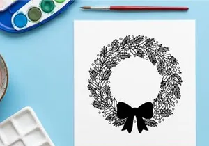 Hand drawn Christmas wreath with red bow isolated on white background for holiday design