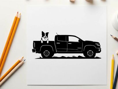 Silhouette of a dog in the back of a pickup truck
