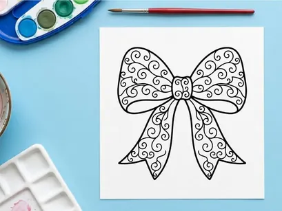Decorative Christmas gift bow with intricate swirl pattern isolated on white background