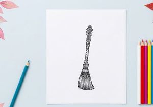 Hand-drawn vintage broom illustration with intricate floral handle design. Classic cleaning tool sketch for retro or rustic home decor themes.