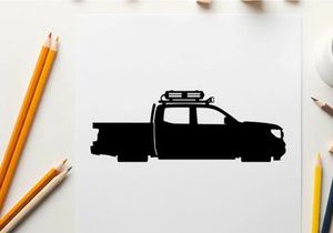 Silhouette of a pickup truck with roof rack