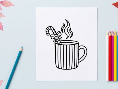 Steaming hot coffee mug with candy cane and snowflake on Christmas morning
