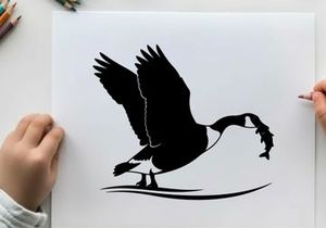 Silhouette of a bird catching a fish in mid air