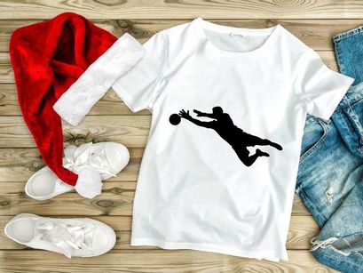 Silhouette of a person playing volleyball or handball in mid air