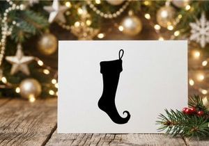 Black Christmas stocking isolated on white background for holiday decor