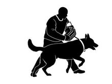 Silhouette of a man walking a dog with a bag