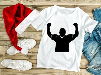 A person celebrating with arms raised in triumph and victory