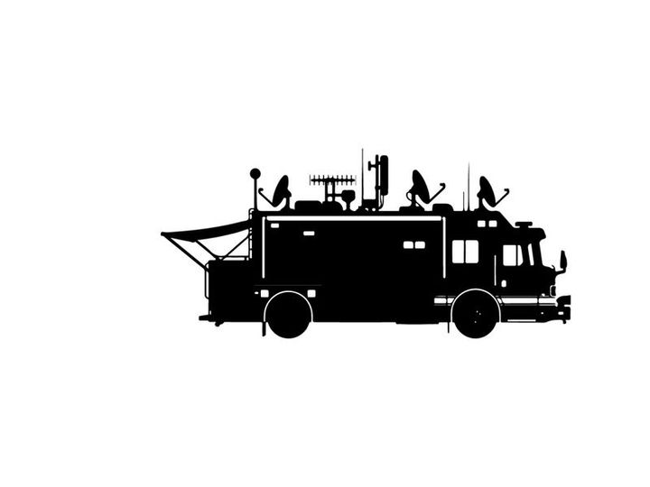 Silhouette of a large recreational vehicle with rooftop equipment