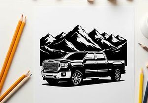 Silhouette of a pickup truck in front of mountains