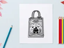 Vintage shopping bag with gothic floral design and cat illustration. Retro tote featuring spooky art for Halloween or goth fashion.