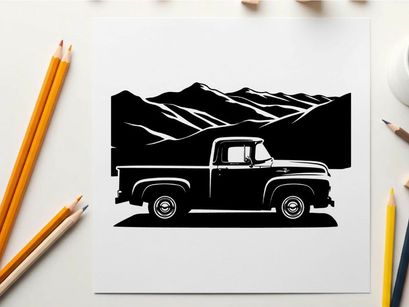 Vintage truck silhouette against majestic mountain range