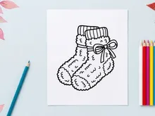 Christmas fuzzy socks line art illustration for holiday coloring book and festive decor