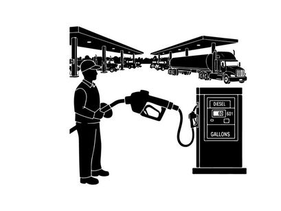 Silhouette of a man refueling a large truck at a gas station silhouette