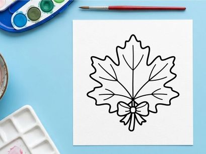 Cozy autumn scene with a decorative maple leaf. Warm, inviting fall decor for seasonal celebrations.