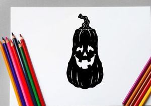 Halloween Jack-o'-lantern with spooky face and candlelight glow