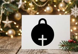 Black Christmas ornament icon with a cross symbol for religious holiday design projects