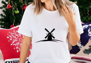 Windmill on rolling hills silhouette