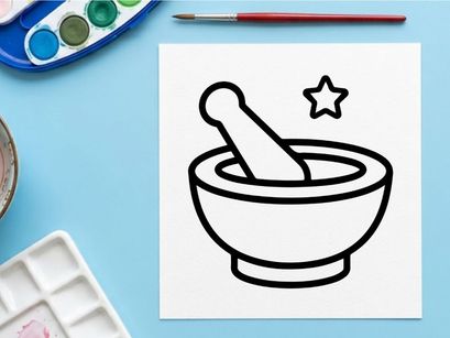 Mortar and pestle with star spice for Halloween seasoning. Classic kitchen tool grinding festive spices for cooking and decoration.