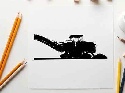 Silhouette of a large industrial machine with conveyor belt in operation