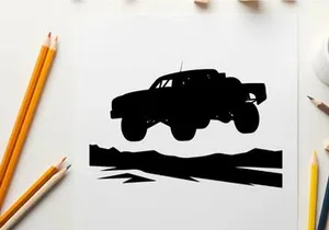 Silhouette of a monster truck in air with large wheels