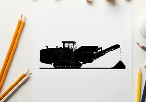 Silhouette of a large industrial crusher machine