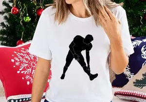 Black silhouette of a person stretching their leg