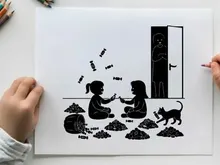 Two girls and a cat playing with piles of rice in silhouette