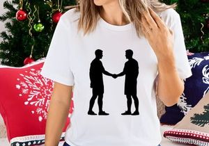 Two men shaking hands in a symbolic gesture of agreement or partnership