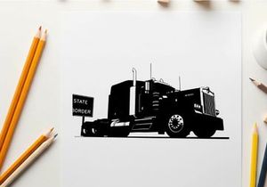Silhouette of a large truck on the road with a sign