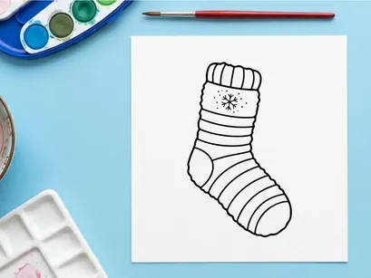 Cozy Christmas sock with snowflake pattern isolated on white background for festive holiday decor