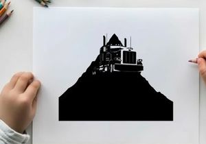 Silhouette of a semi truck on a hill