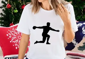 A silhouette of a man playing handball in a dynamic pose with outstretched arms