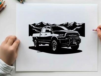 Silhouette of a pickup truck in front of mountains