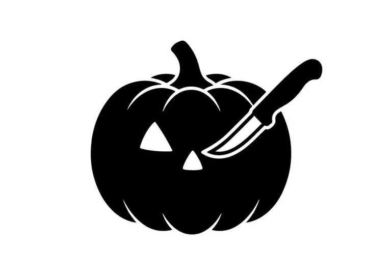 Halloween Pumpkin Carving with Knife and Jack-o'-Lantern Face