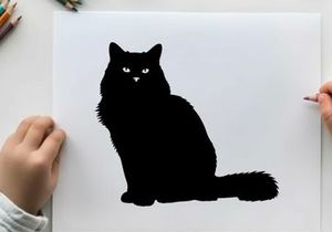 Silhouette of a black cat sitting and looking forward