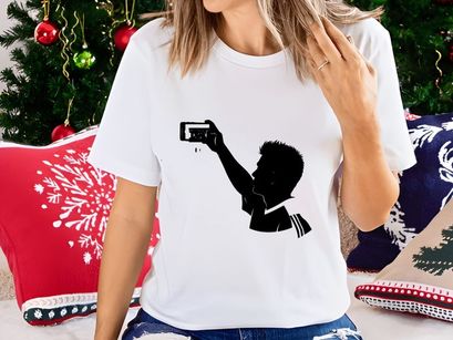 Silhouette of a boy taking a selfie with a smartphone